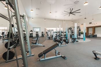 fitness center with a smith machine and free weights